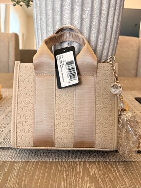 GUESS Beige Mini Tote with Signature G Print and Charm